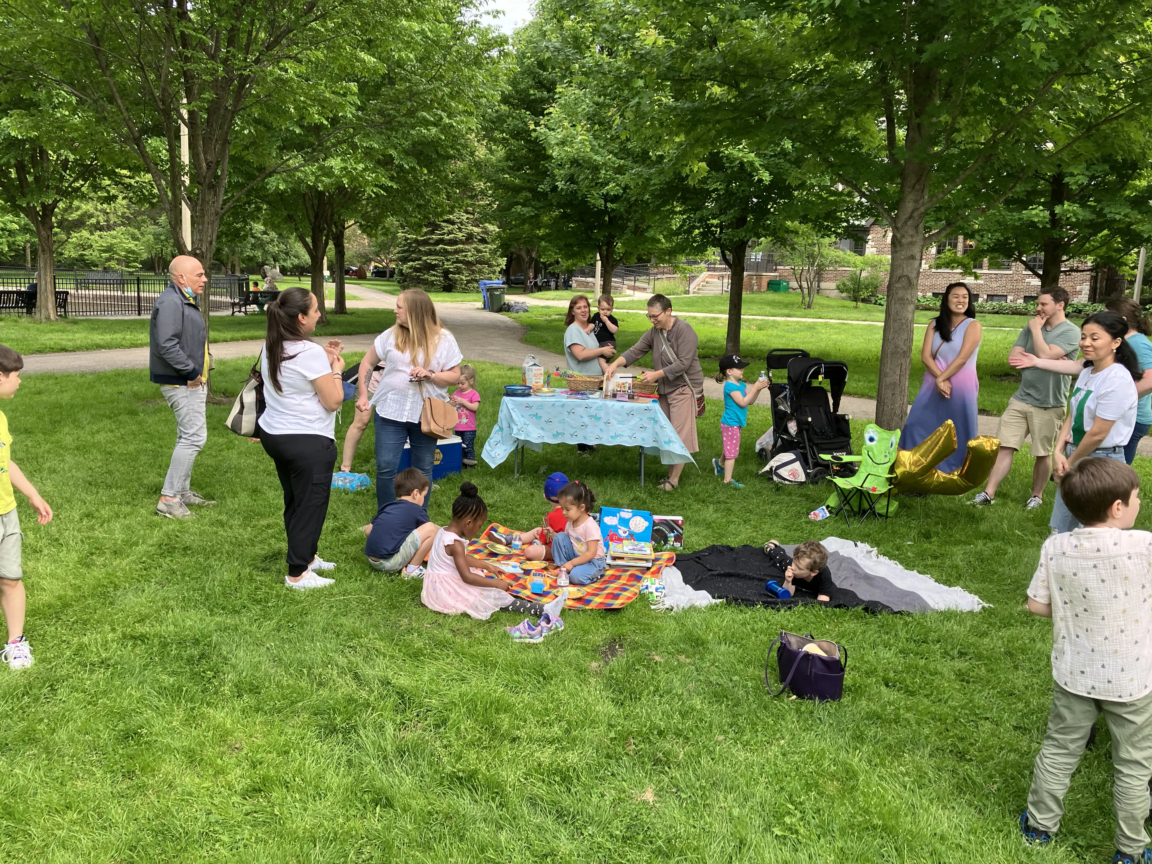 A host of people at the park celebrating Graham's birthday.