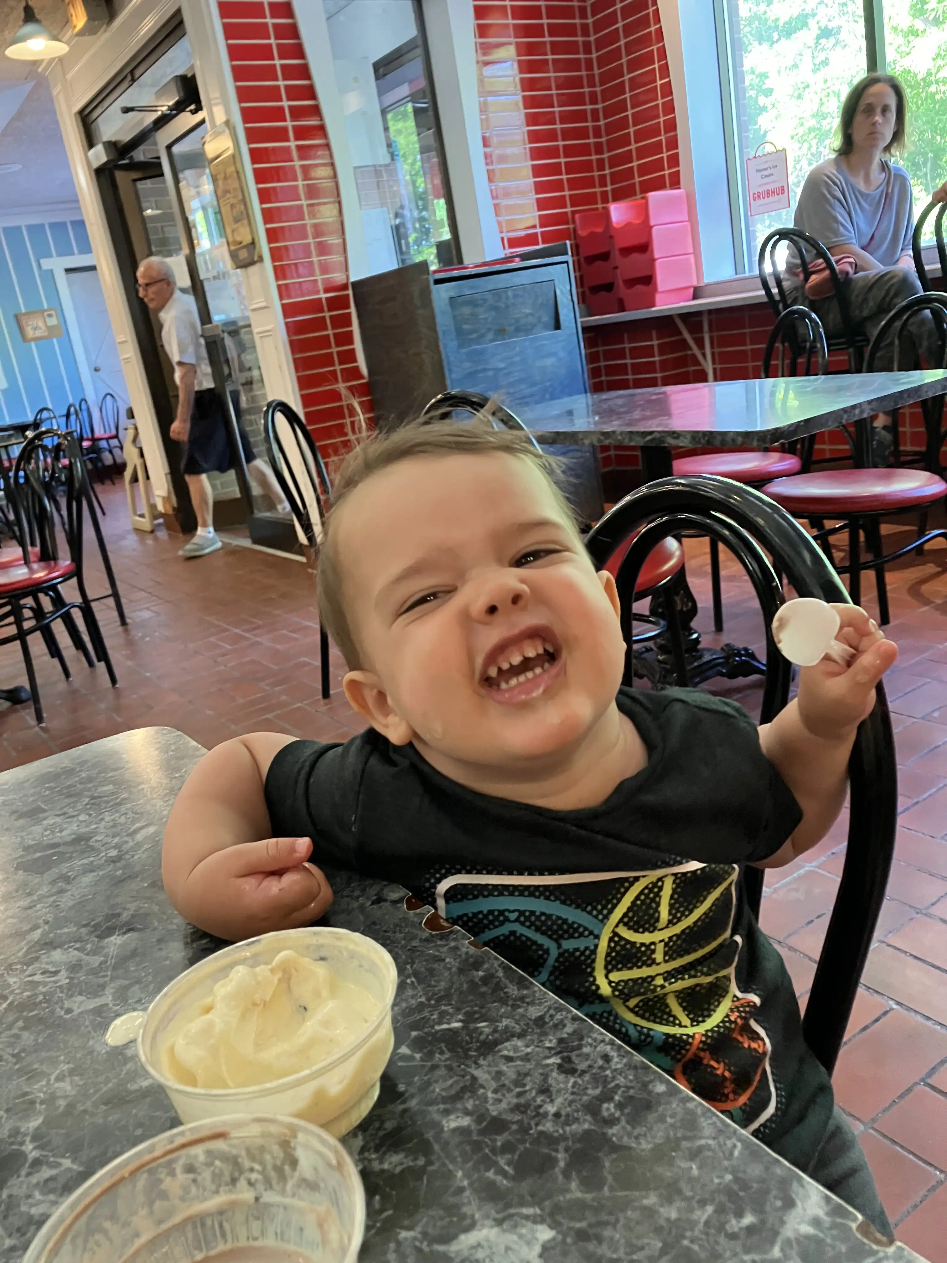 Royal at Homer's with face covered in vanilla ice cream.