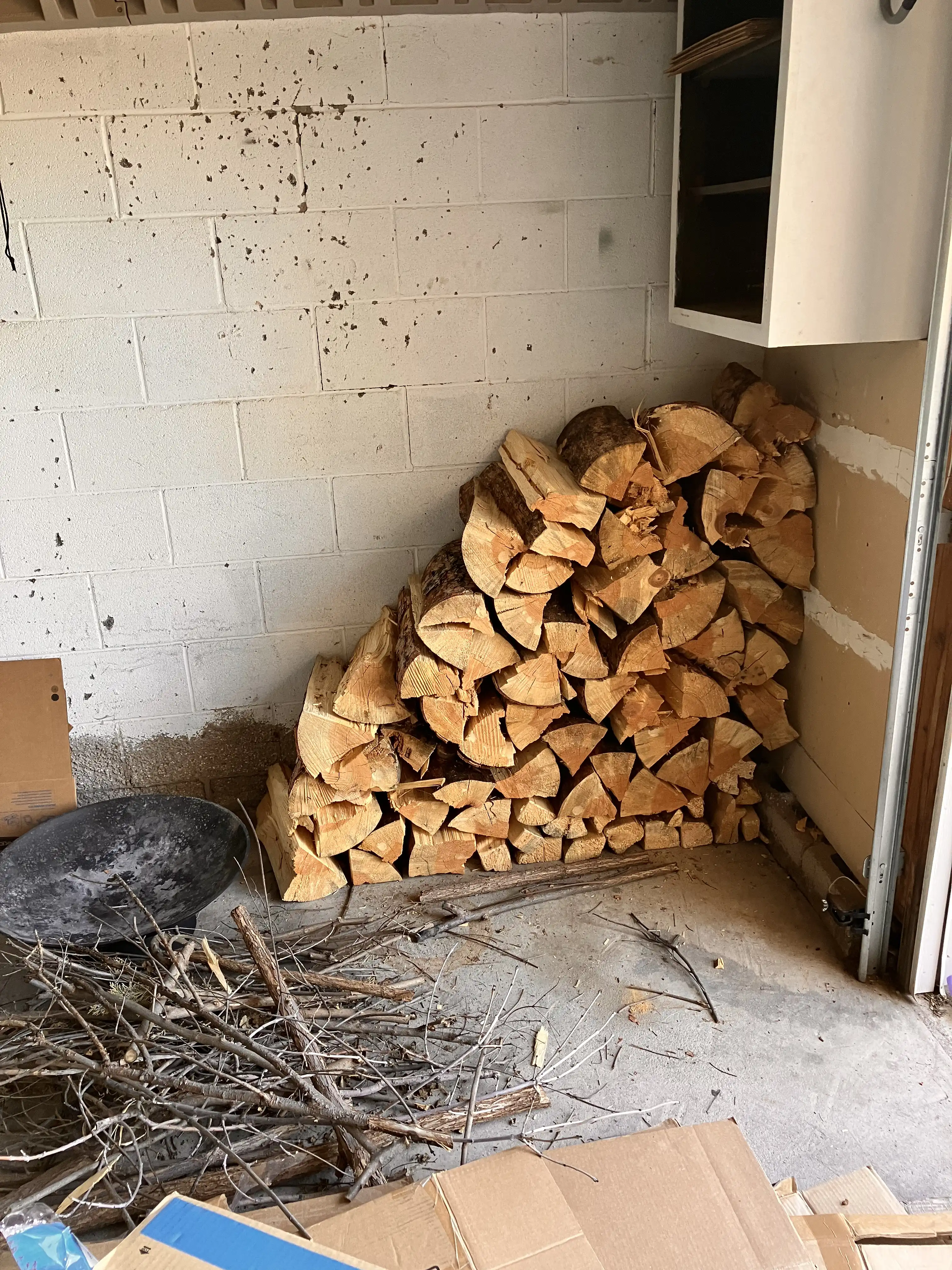 Split wood stacked in our garage.