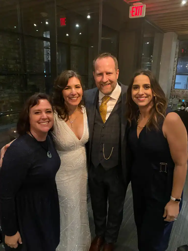 Amie, Val, David and Elda dressed for Val and David's wedding.