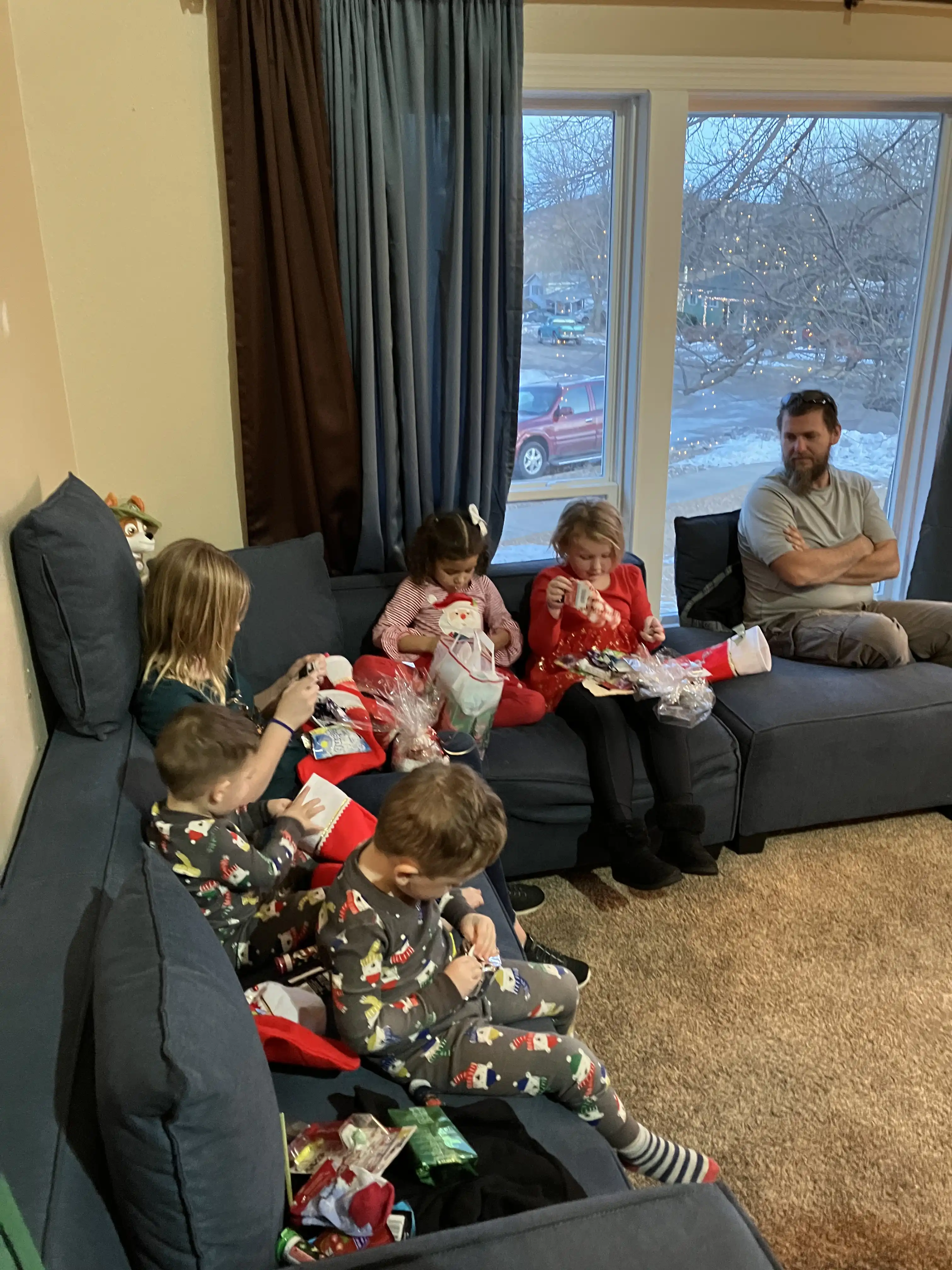 The kids opening their stockings.