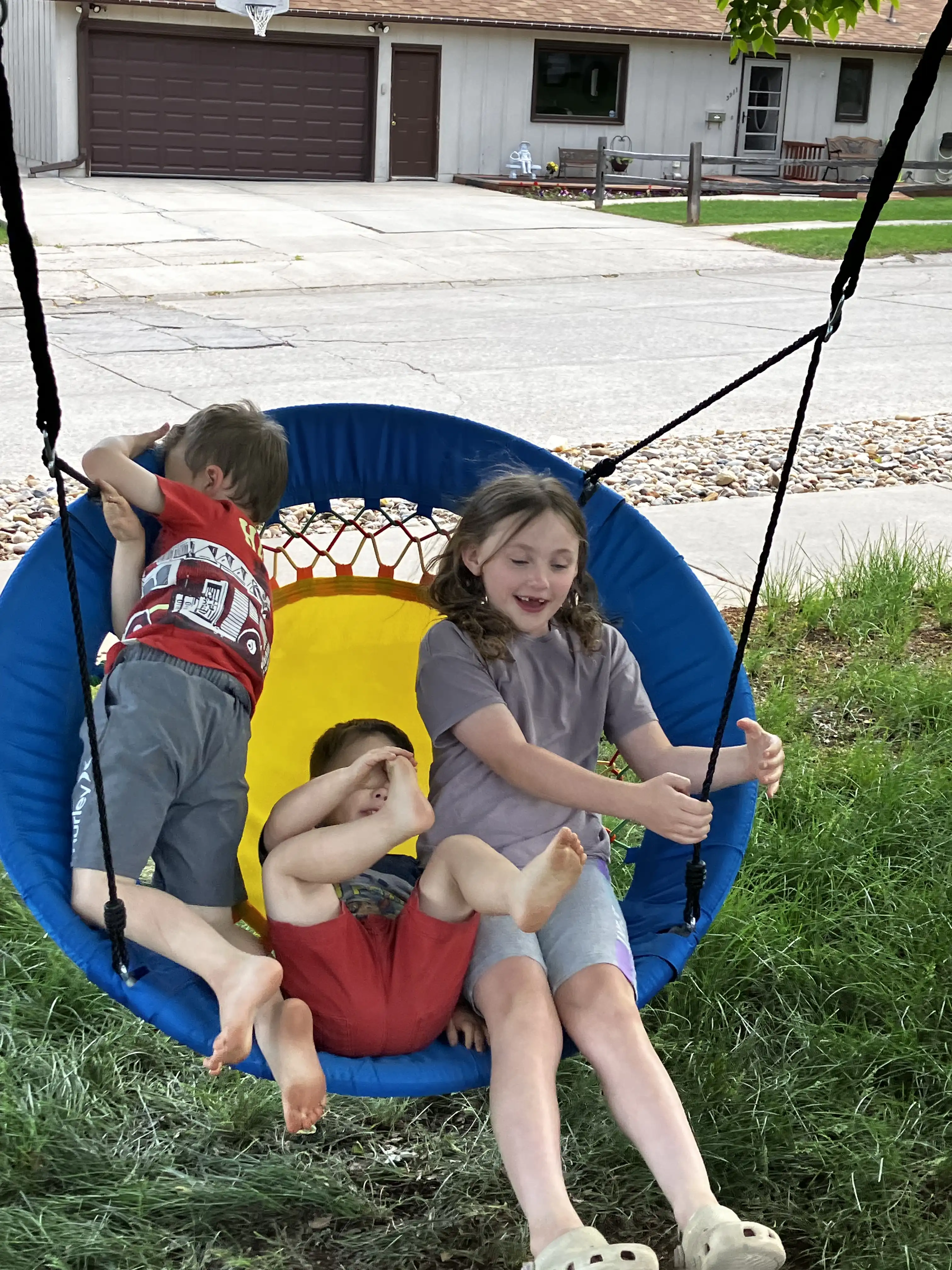 Graham, Royal and Selah swinging together.