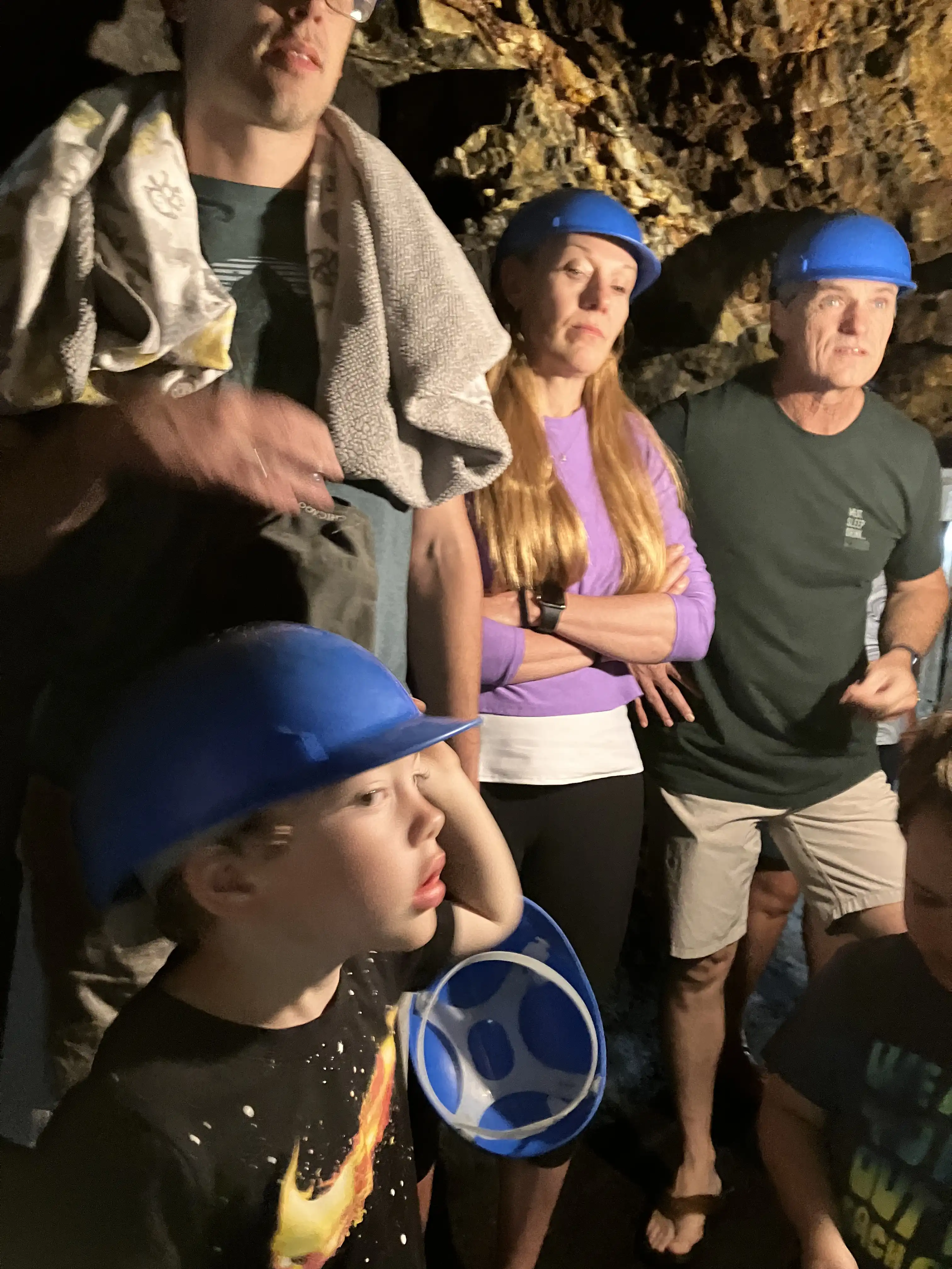 Listening to the tour guide inside Rushmore Cave. In the back: Alex, Shawna and Paul.