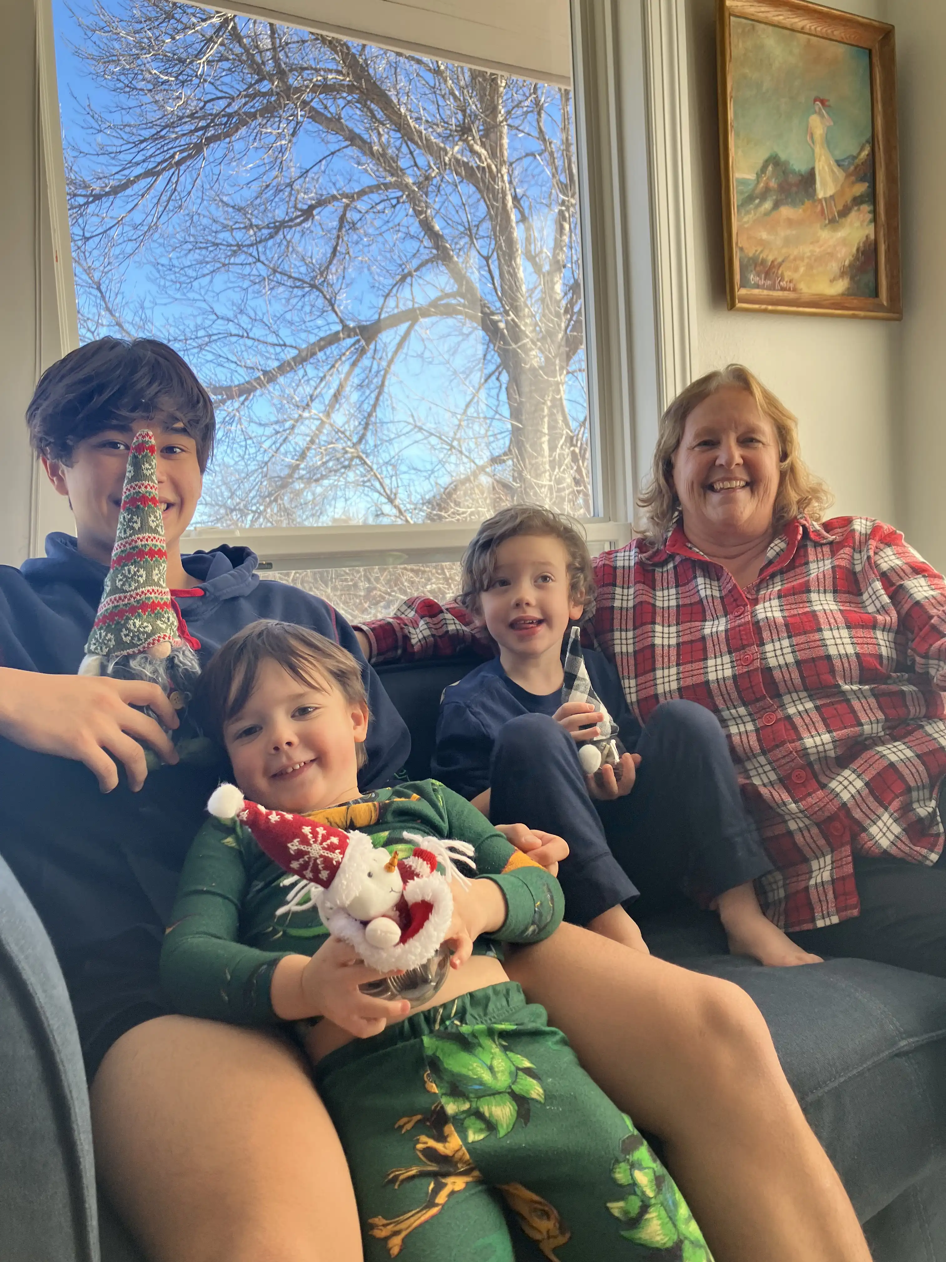 Grandma Jaynne poses with her grandkids, Ty, Royal and Graham