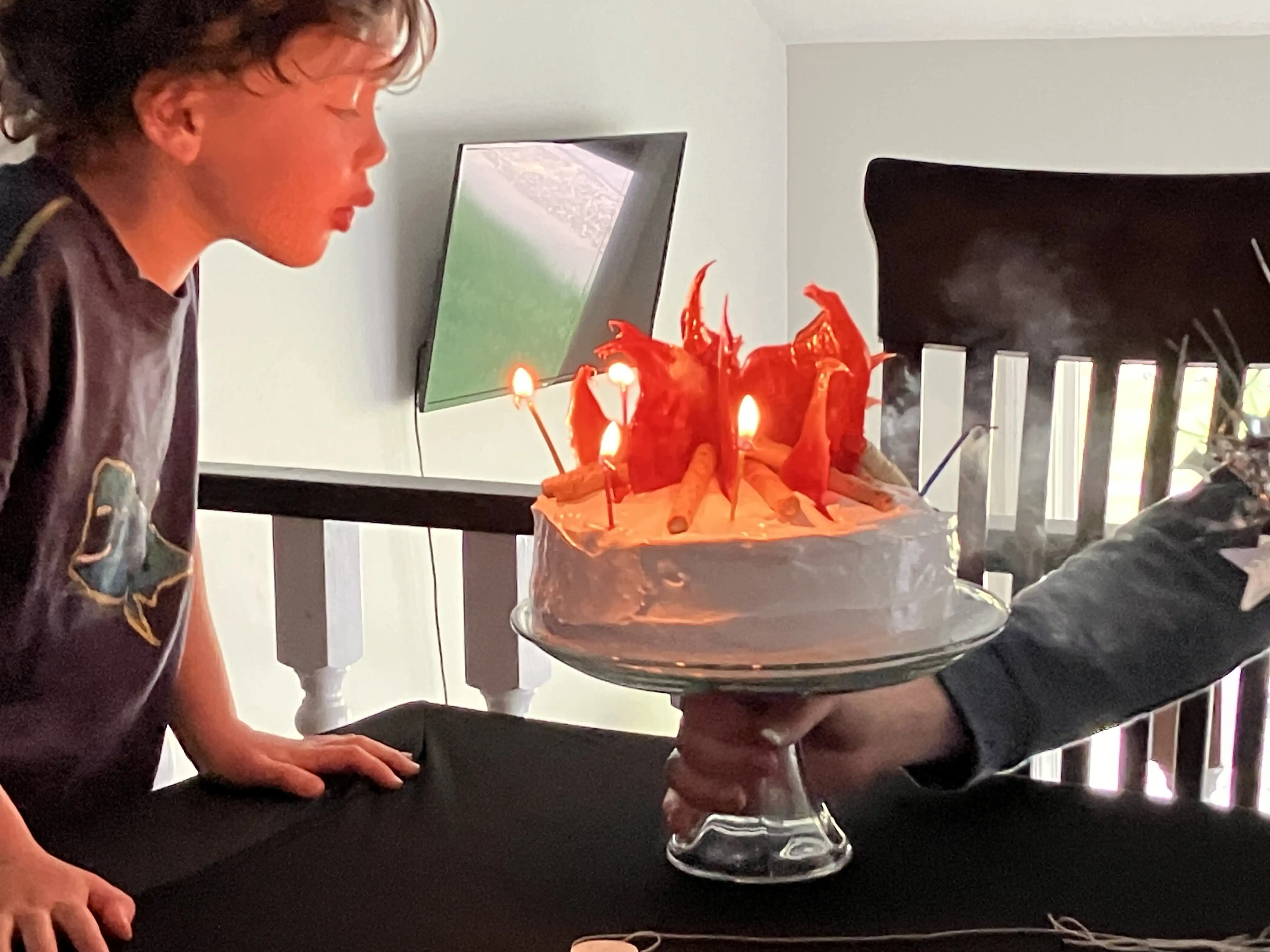 Graham blows out his cake