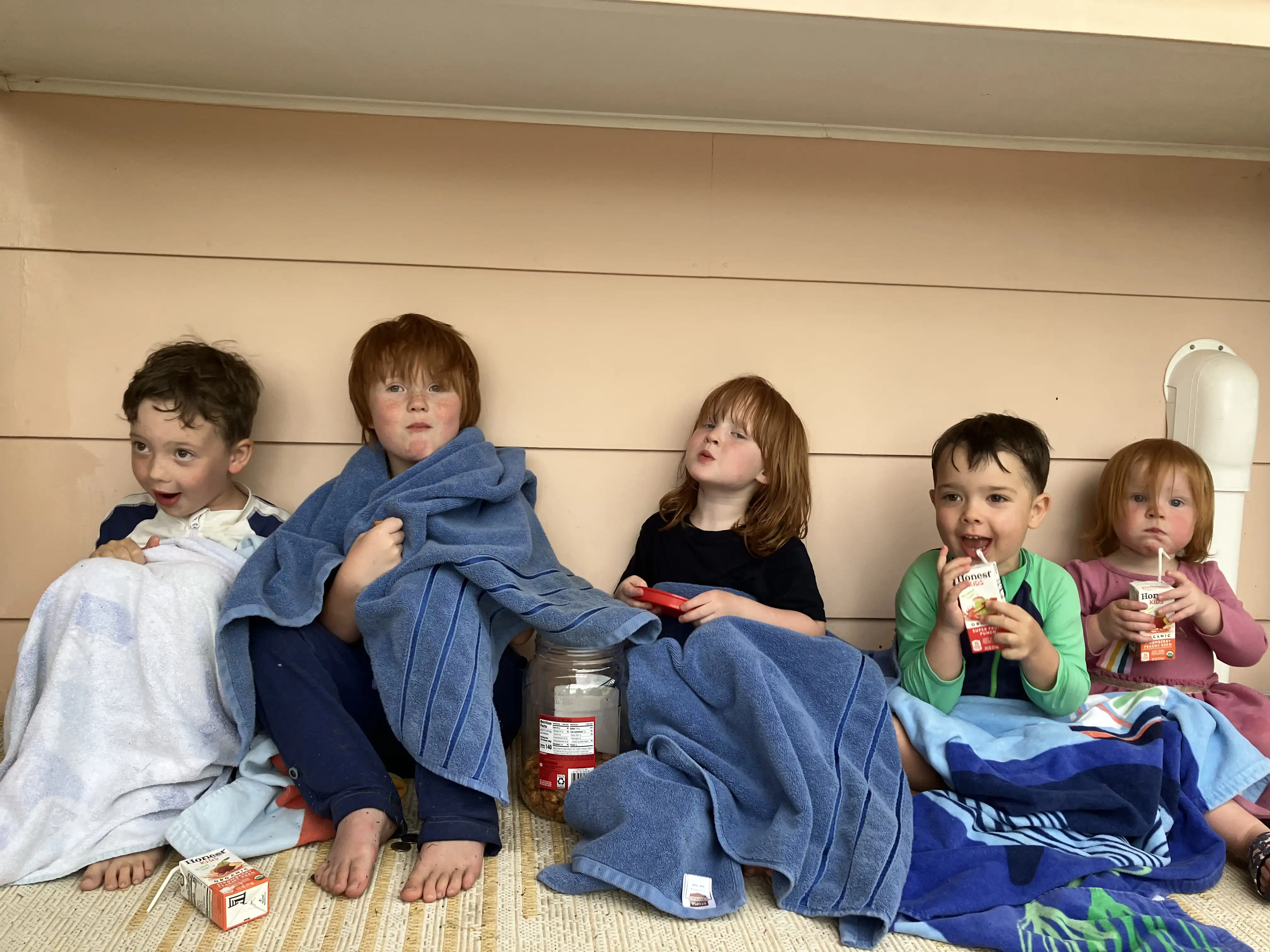 Graham, Sonny, Ingrid, Royal and Opal enjoying snacks on our porch. Elovie is working on a craft inside.